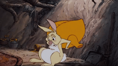 Cartoon Rabbit Sitting In Cave With Pillow GIF