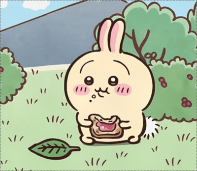 Cartoon Rabbit Sitting In Grass Eating GIF