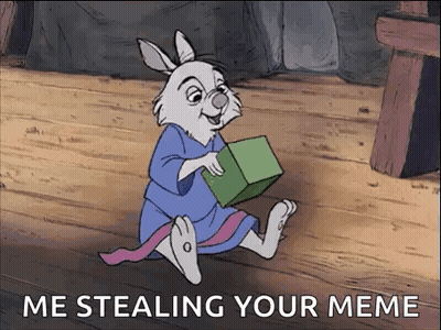 Cartoon Rabbit Sitting On Wooden Floor Holding Green Box GIF