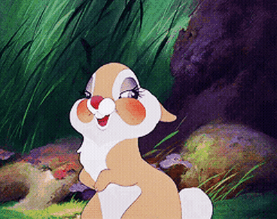 Cartoon Rabbit Standing In Grass GIF