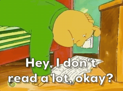Cartoon Reading Book Says Hey I Don't Read A Lot GIF
