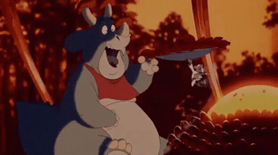 Cartoon Rhinoceros Holding Mushroom GIF