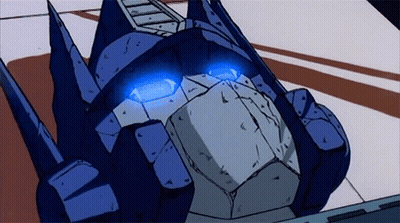Cartoon Robot With Blue Eyes Close Up GIF