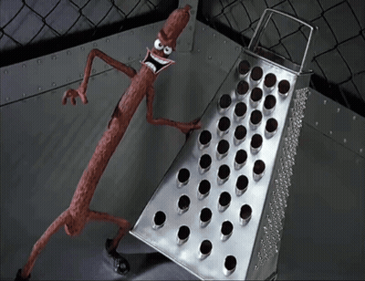 Cartoon Sausage Standing Next To Grater GIF