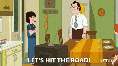 Cartoon Says Let's Hit The Road In Front Of Television GIF