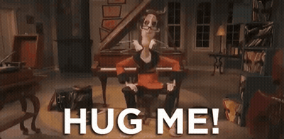 Cartoon Sitting In Chair Arms Outstretched Saying Hug Me GIF