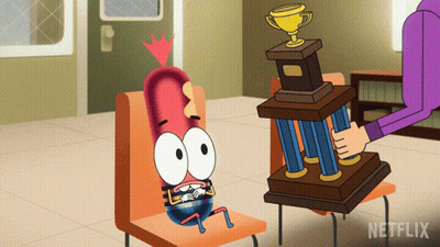 Cartoon Sitting Next To Netflix Trophy GIF