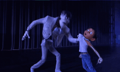 Cartoon Skeleton Holding Child's Arm GIF