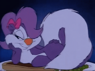 Cartoon Skunk Sitting On Plate With Toast GIF