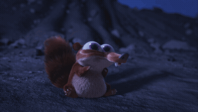 Cartoon Squirrel Sitting At Night GIF