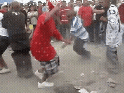 Cartoon Standing In Grassy Field With Chola Mais GIF