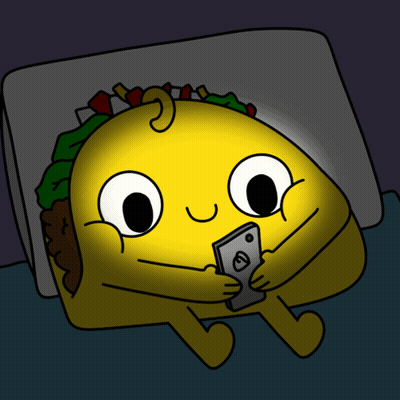 Cartoon Taco Lying In Bed Looking At Cell Phone GIF