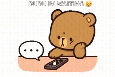 Cartoon Teddy Bear Sitting At Table With Cell Phone And Speech Bubble GIF