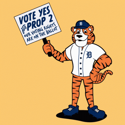 Cartoon Tiger Holding Vote Yes For Prop 2 Sign GIF
