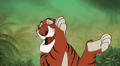 Cartoon Tiger Laying Down In Jungle With Mouth Open GIF