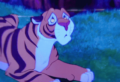 Cartoon Tiger Laying In Grass GIF