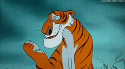 Cartoon Tiger Standing In Grass With Paws Up Smiling GIF