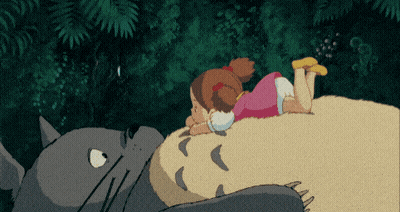 Cartoon Totoro Sitting On Hill GIF