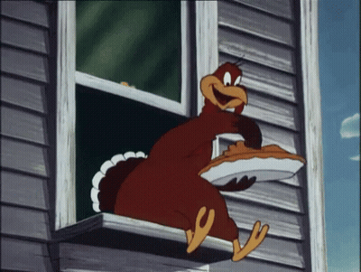 Cartoon Turkey Holding Pie In Beak GIF