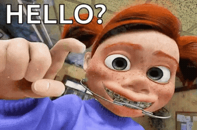 Cartoon With Braces Pointing And Saying Hello GIF