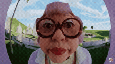 Cartoon Woman With Glasses And Purple Hat Looking At Camera GIF