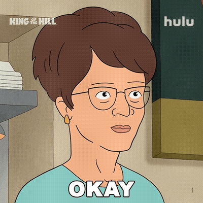 Cartoon Woman With Glasses Saying Okay GIF