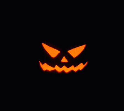 Carved Halloween Pumpkin With Glowing Face GIF