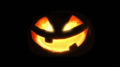 Carved Halloween Pumpkin With Glowing Face GIF