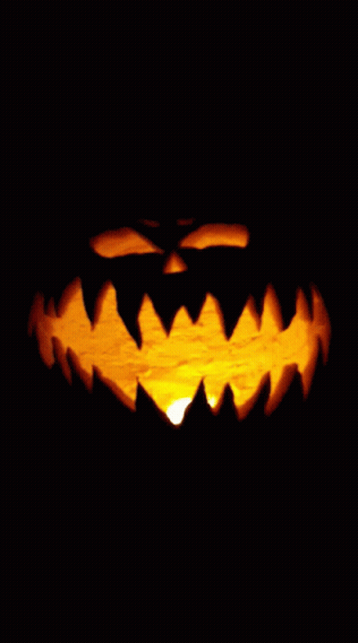 Carved Halloween Pumpkin With Glowing Mouth GIF