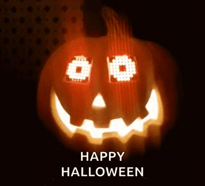 Carved Pumpkin Saying Happy Halloween GIF