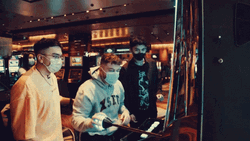 Casino Slot Machine Group Playing GIF