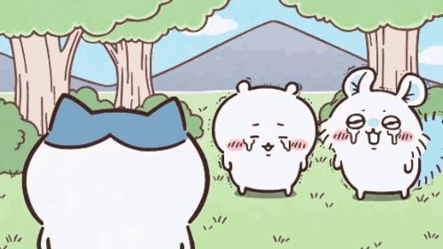 Cat And Two Rabbits In Field GIF