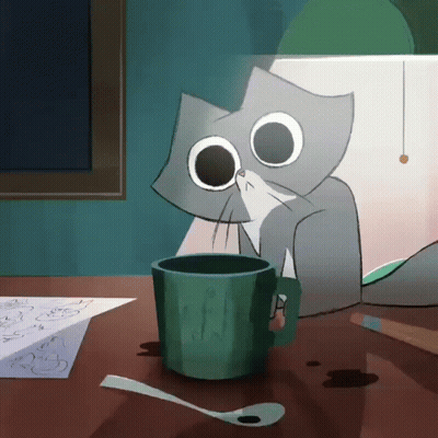 Cat At Table With Cup Of Coffee GIF