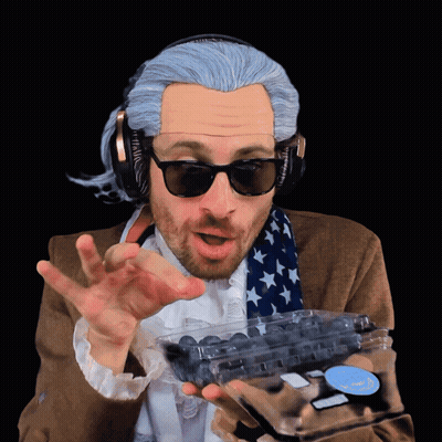 Cat Face With Blueberries And Green Leaf GIF