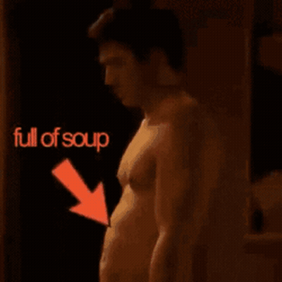 Cat Held Full Of Soup GIF