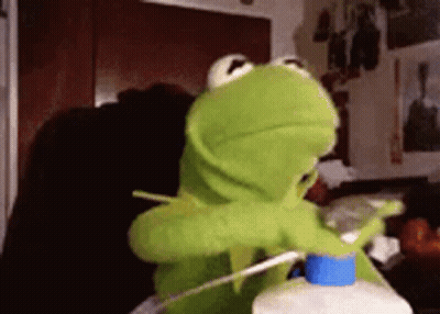 Cat Holding Tube Of Cat Food GIF