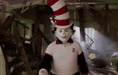 Cat In The Hat In White Skull Shirt GIF
