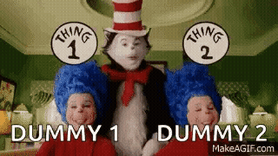 Cat In The Hat Standing Next To Two Dummy Boys GIF