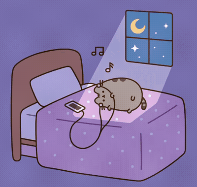 Cat Laying On Bed Listening To Music GIF