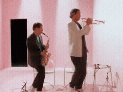 Cat Playing Trumpet ILoveCatGame GIF
