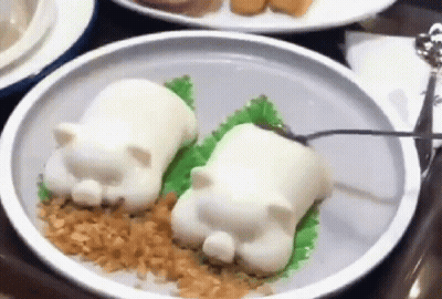 Cat-Shaped Food On Plate With Spoon GIF