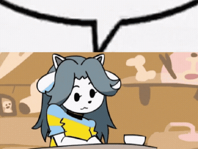 Cat Sitting At Table With Speech Bubble GIF
