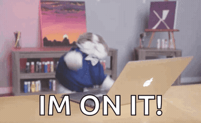 Cat Sitting In Front Of Laptop Saying Im On It GIF