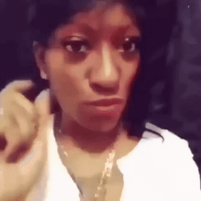 Cat Sitting On Bed Looking Out Window GIF