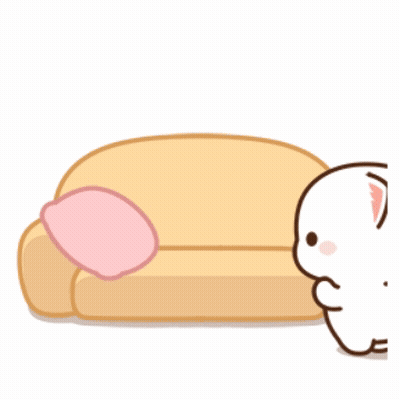 Cat Sitting On Couch With Pink Pillow GIF