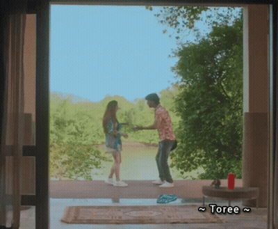Cat Standing Next To Hamburger Looking At Camera GIF