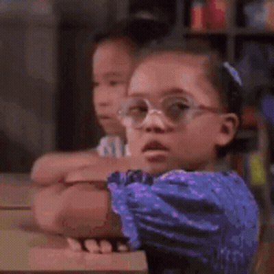 Cat Wearing Glasses Sitting On Chess Board GIF