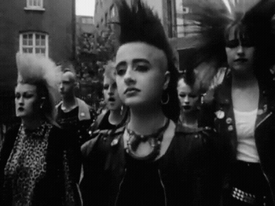 Cat With Mohawk And Leather Jacket Says Hello GIF