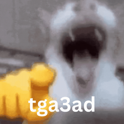 Cat With Open Mouth And Yellow Fist Saying Tga3ad GIF
