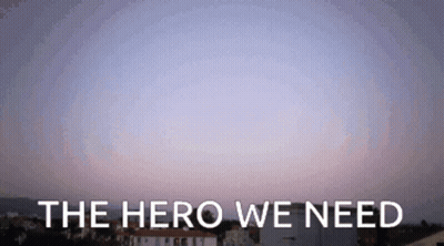 Cats Laying On Couch One Standing On Back GIF